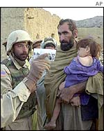 Soldiers ask Afghans if they have seen Osama Bin Laden