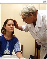 Doctor examines teenage hostage