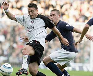 Steed Malbranque shields the ball from Sean Davies 