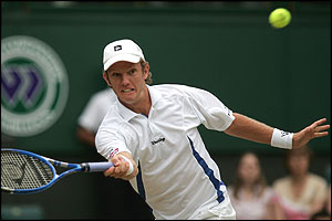 Swede Thomas Johansson in action against the USA's Andy Roddick