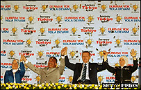 اردوغان و گل در کنار همسرانشان